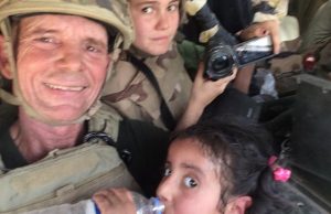 Bible Verse Inspires US Vet Dave Eubank, to Risk His Life and Save a Girl from ISIS Dave Eubank in the Humvee with the girl after the rescue