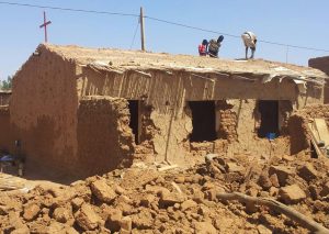 Workers tear down church building in Omdurman, Sudan.