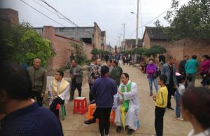 Dozens Injured as Chinese Christians and Police Clash Chinese Christians