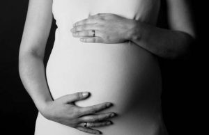 Bishops Welcome Efforts to Defend Teenager’s Unborn Child A Pregnant Woman Feeling her Unborn Child