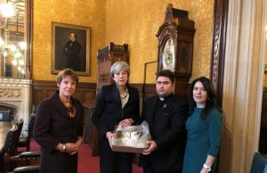 Theresa May Receives Bible Burnt by Islamic State Theresa May